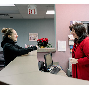 Patient at front desk