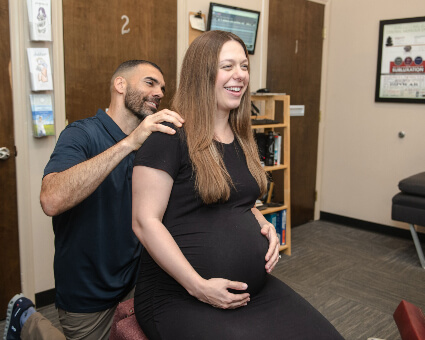 adjusting pregnant woman
