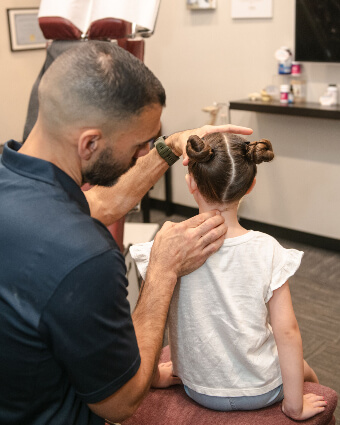Adjusting child's spine