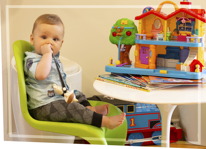 baby sitting on a chair