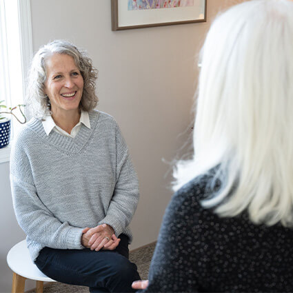 Dr Lisa talking with a patient