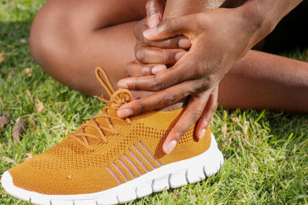 Woman with ankle pain