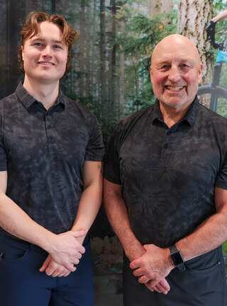 Calgary NW chiropractors Dr. Les Davidson and Dr. Ford Davidson team photo