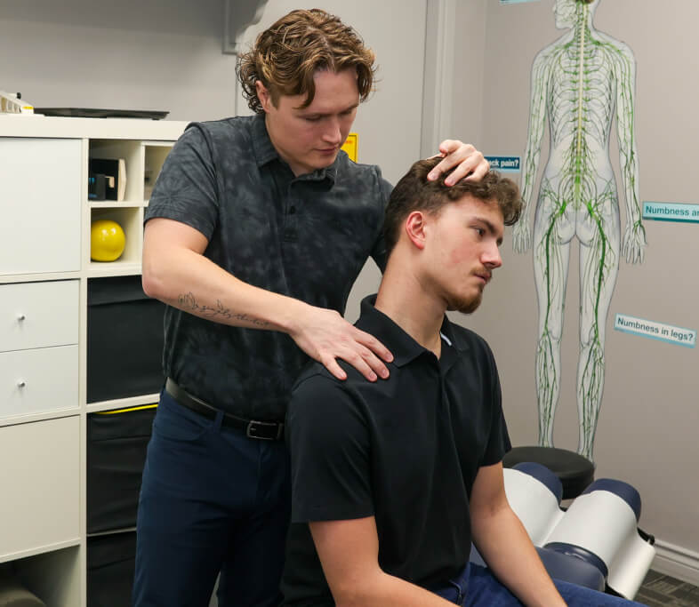 Dr. Ford adjusting patient