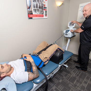 Patient on Spinal Decompression table