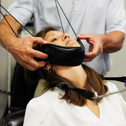 Female patient treated with chiropractic BioPhysics