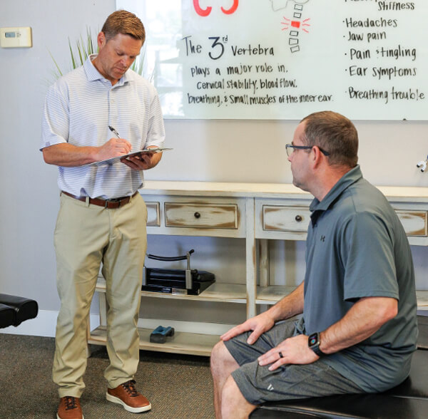 Dr. Green interviewing patient