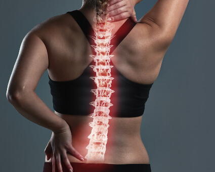 Spine overlay on female patient's back