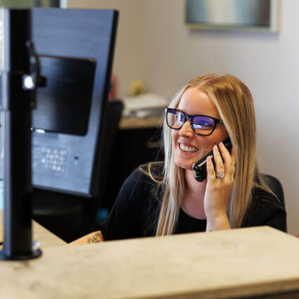 front desk team answering the phone