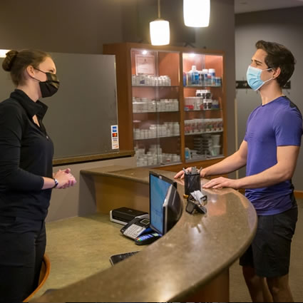 Patient at front desk