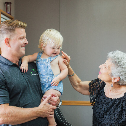 Stillpoint Family Chiropractic Chiropractor Dr. Mary Grace talking to toddler