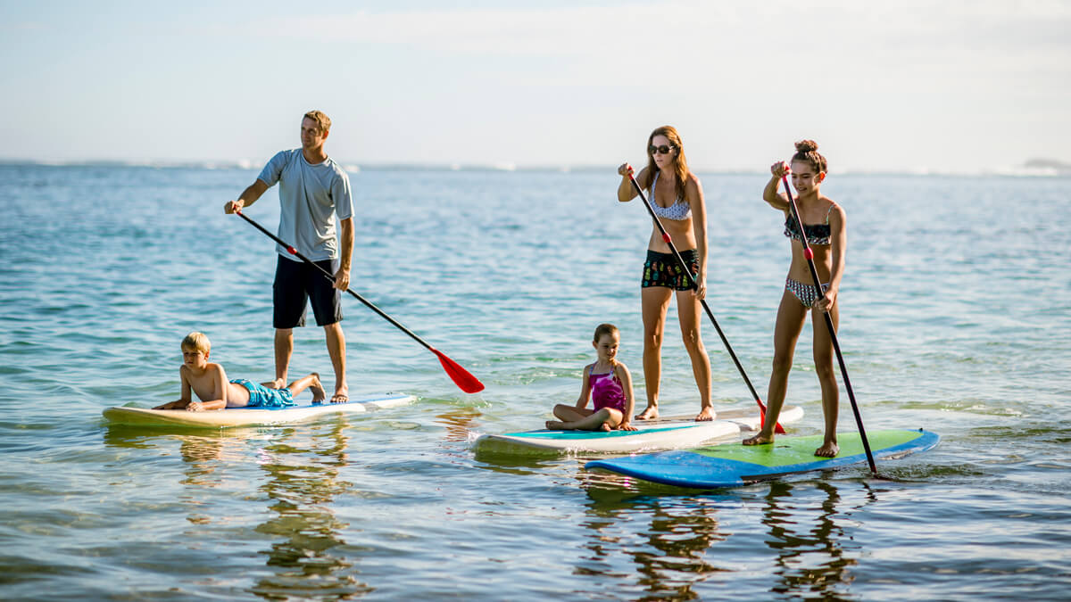 family paddleboarding