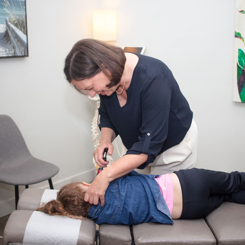 activator adjustment on childs back