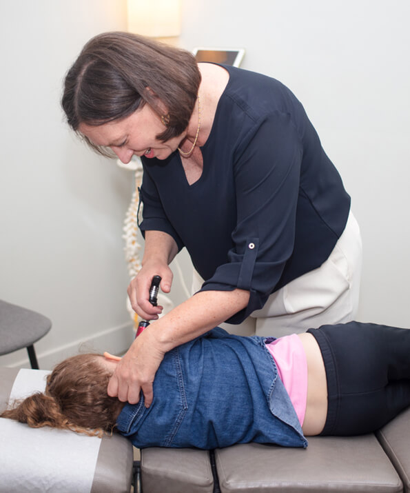 Dr, Tamara checking kid patient