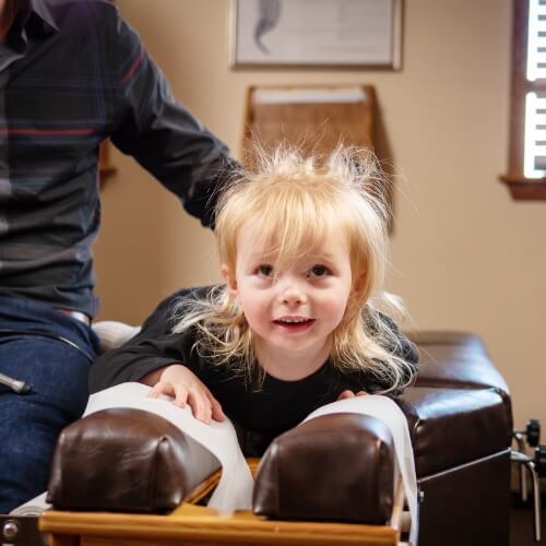 Child receiving an adjustment