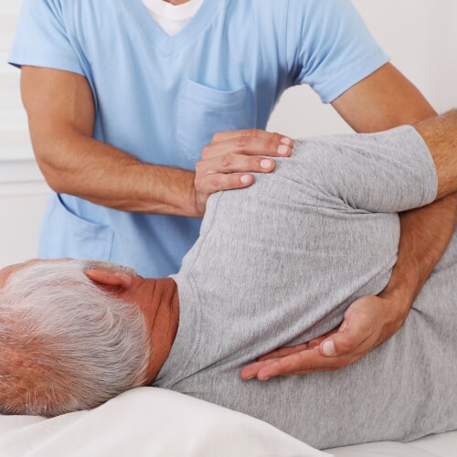 Chiropractic adjustment for elderly male