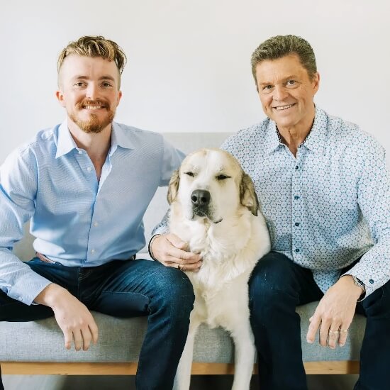 Silverdale chiropractors at Clark Chiropractic posing for a photo with a dog