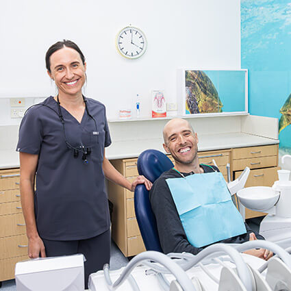 Dr Jacquit smiling with patient