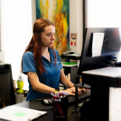 Hailie at reception desk