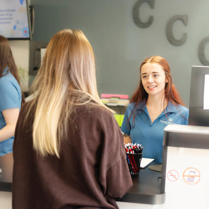 woman at front desk