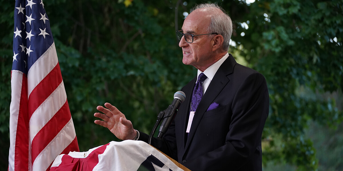 Ken-at-Podium-Profile