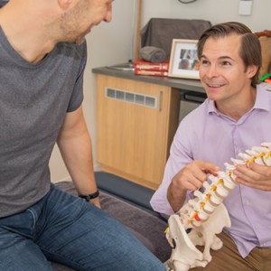 Dr Stephen educating patient