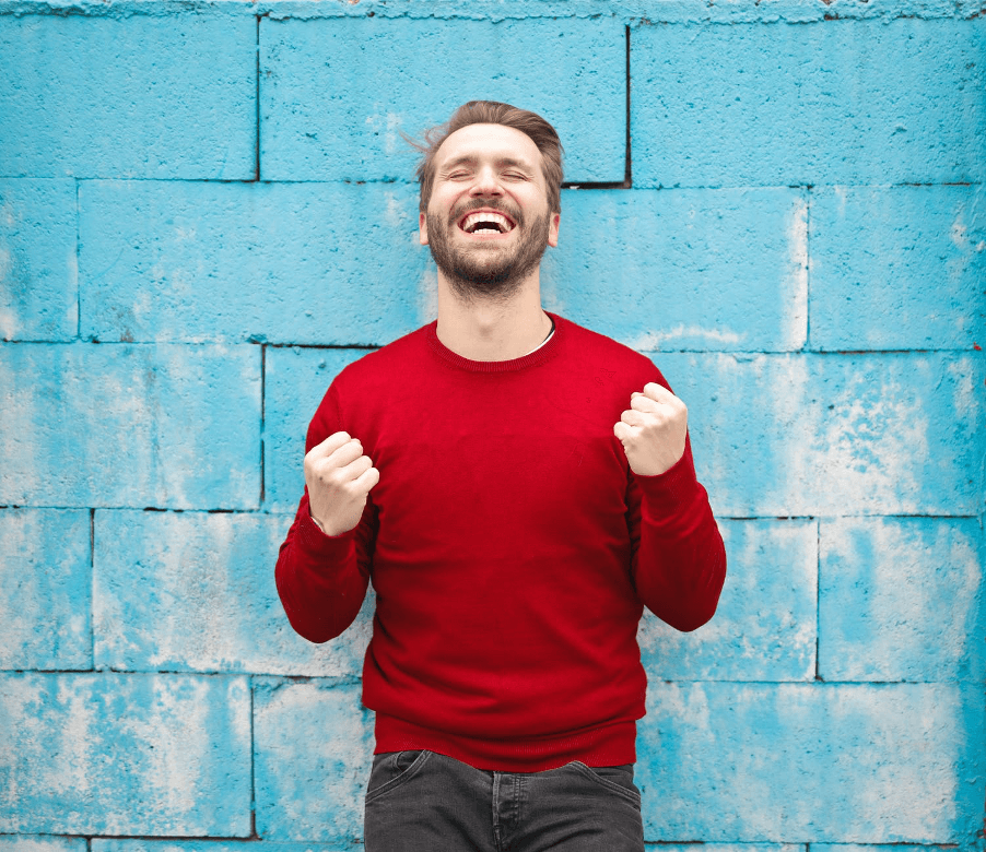 Happy man in red sweater