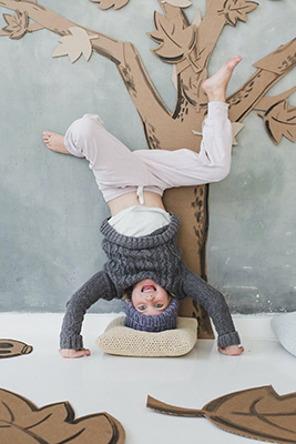 Child doing handstand