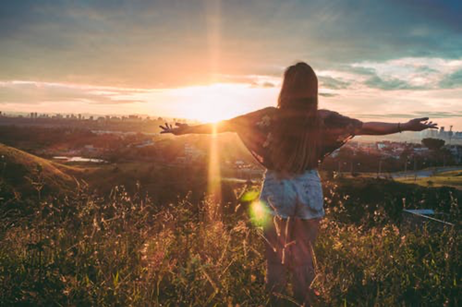 woman watching sunset