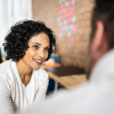 woman listening to doctor