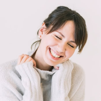woman nice smile with eyes closed