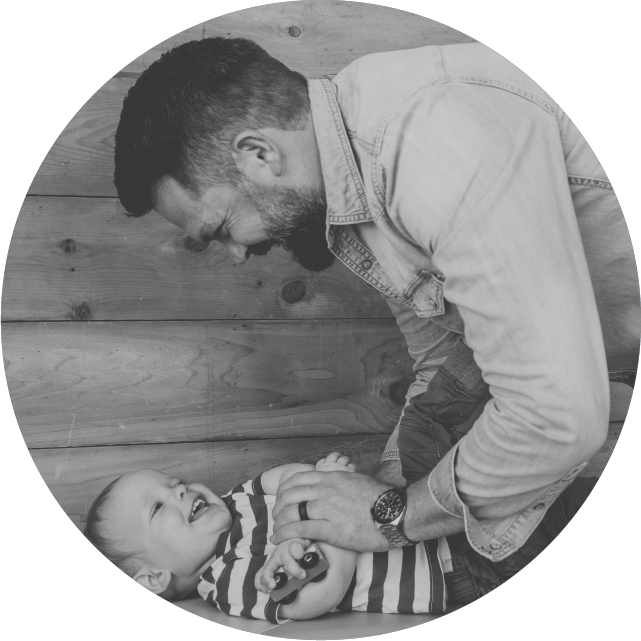 Chiropractor Castle Rock, Dr. Joseph Schmidt with young child