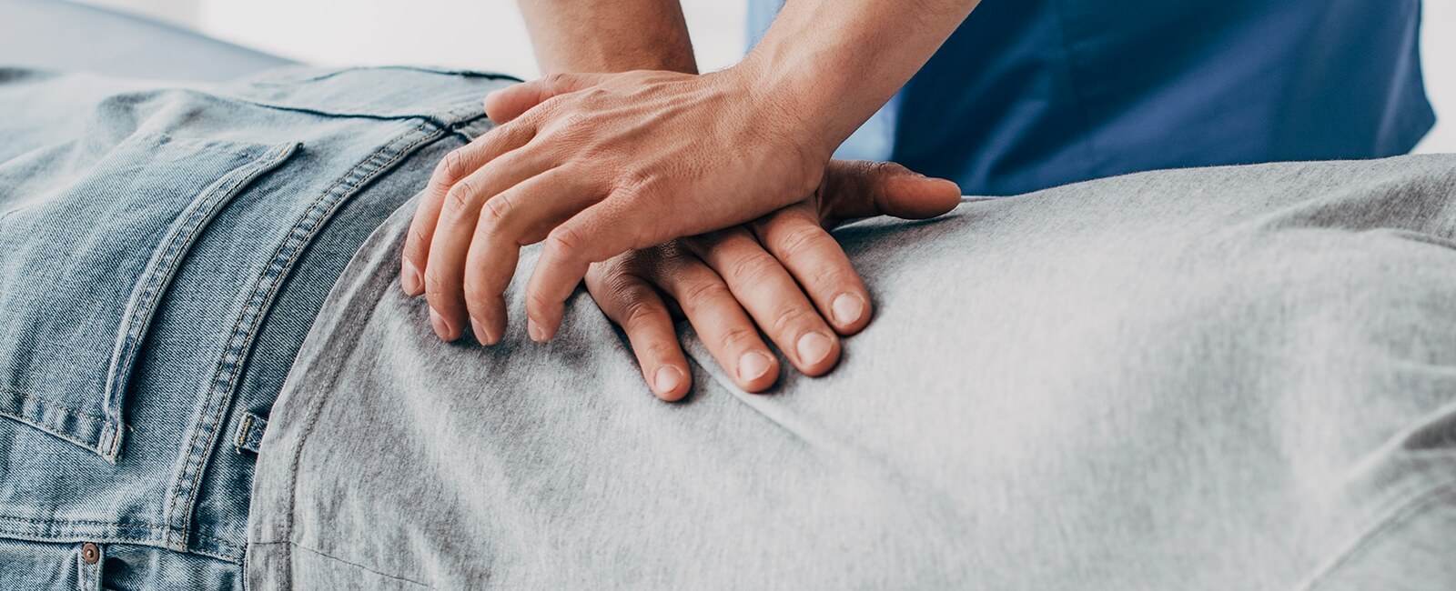 Patient receiving a lower-back adjustment