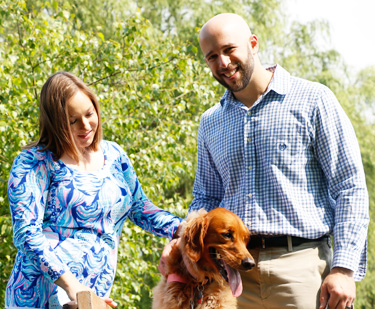 Dr. Eichner with his wife and dog