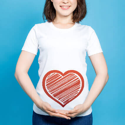 heart-over-womans-stomach-clasped-hands-sq