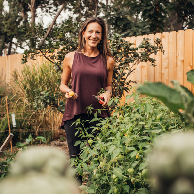 Nikki standing in the garden