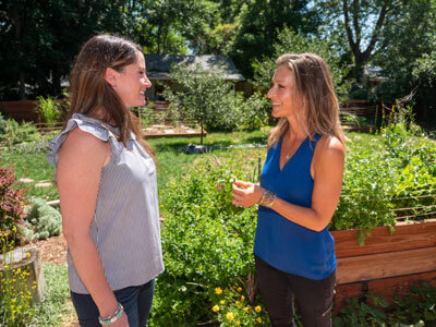 Nikki talking with client