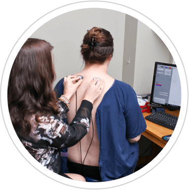 Patient getting scanned by doctor