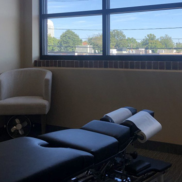 Exam room with chiropractic table
