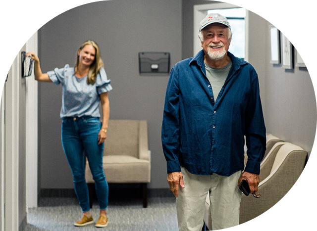 doctor with patient smiling