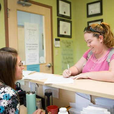 Patient filling out paperwork