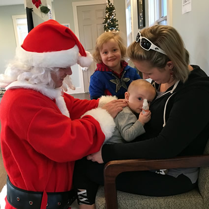 Dr. Steve adjusting toddler