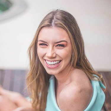 Woman smiling widely summer outdoor