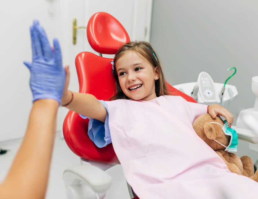 kid at dentist chair