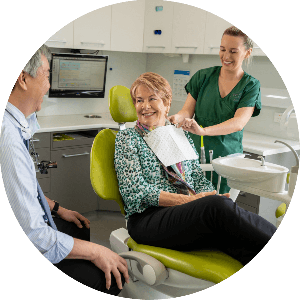Patient sitting in dental chair