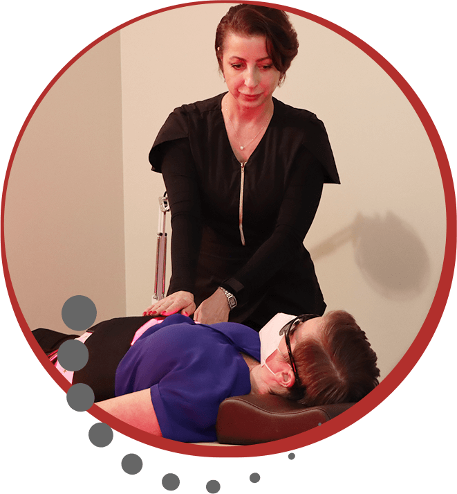 Massage therapist massaging a patient
