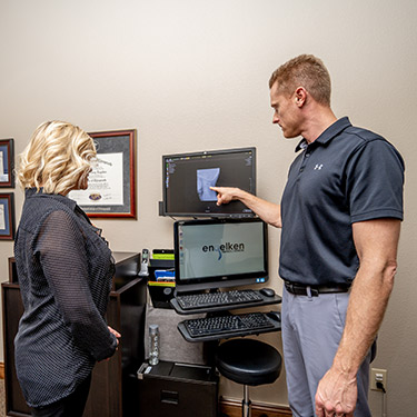 Dr Dave reviewing xrays with patient