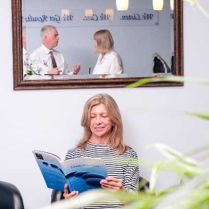 Woman looking at magazine