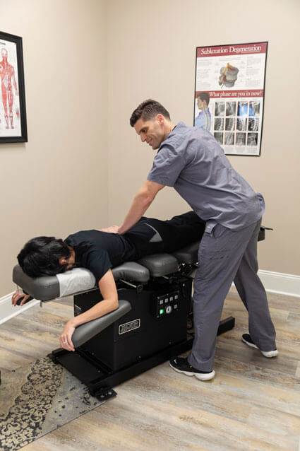 Chiropractic adjustment by Dr. Broadus