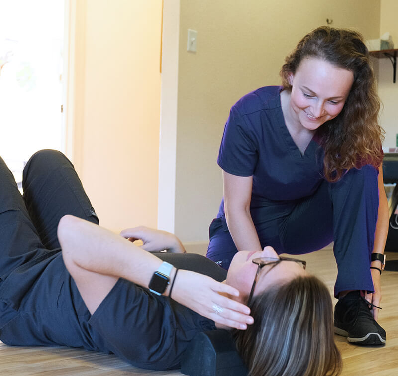 staff with patient on floor